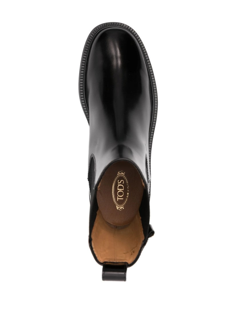 Tod's Polished Black Leather Ankle Boot With Pebble Detailing