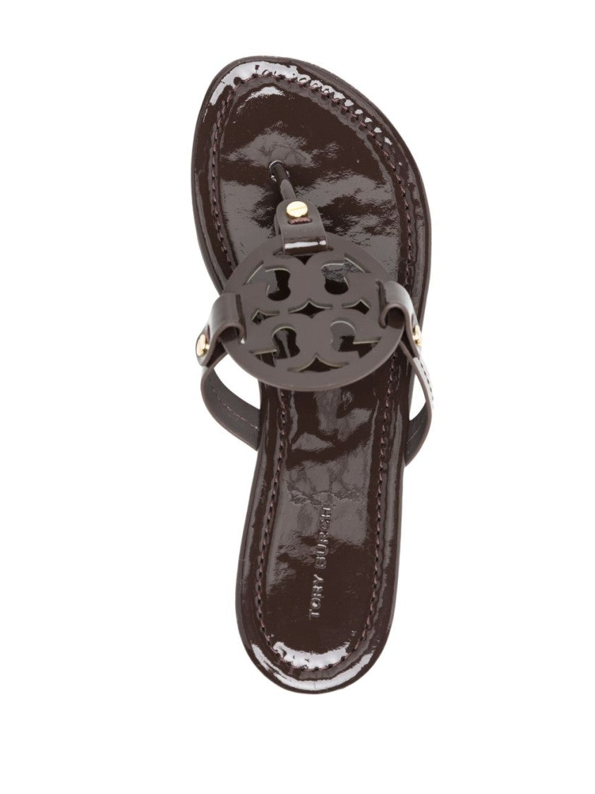 Tory Burch Glossy Black Flats With Circular Emblem Detail