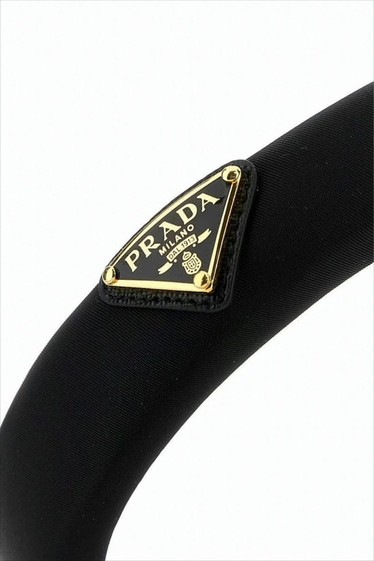 Prada Sleek Padded Headband With Triangular Metal Logo