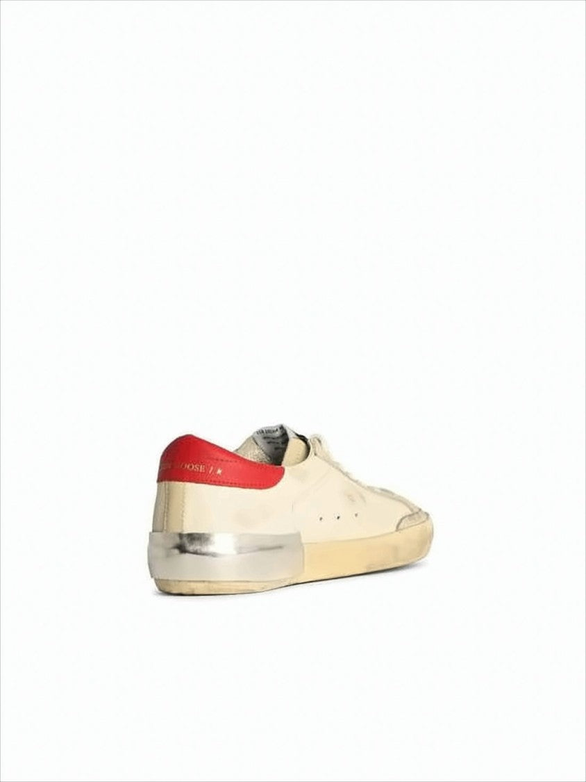 Golden Goose Distressed Low-Top Sneakers With Vintage Aesthetic