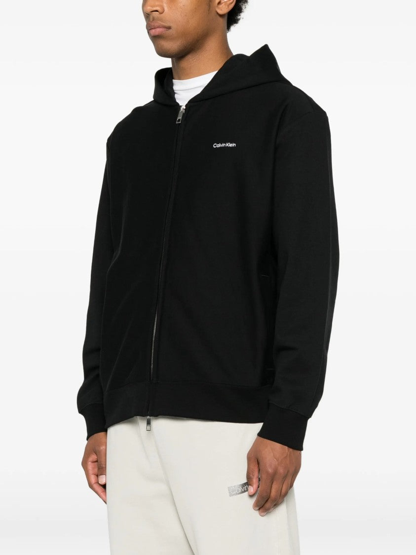 Calvin Klein Minimalist Black Hoodie With Full Front Zipper And Subtle Logo