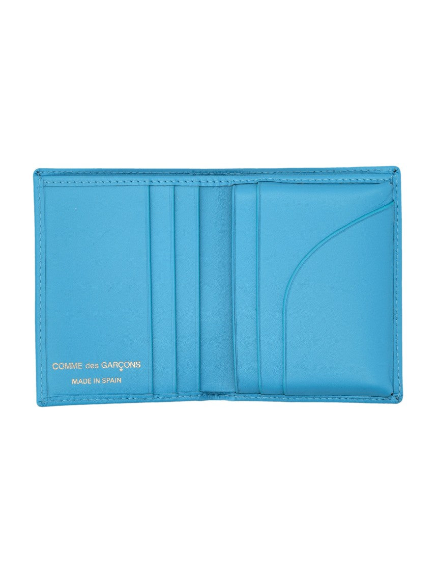 Comme Des Garçons Bifold Wallet With Vibrant Blue Exterior