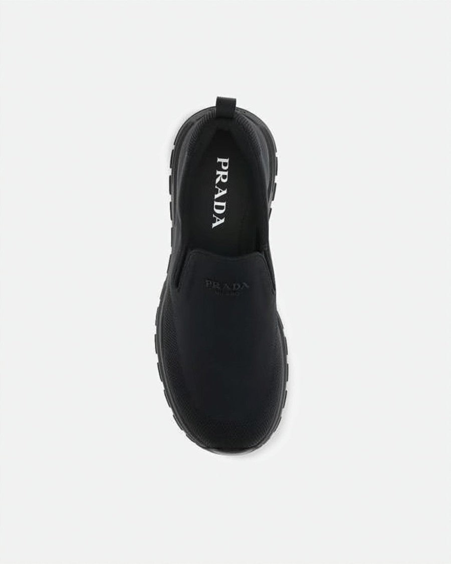 Prada Streamlined Slip-On Sneakers With Textured Rubber Sole