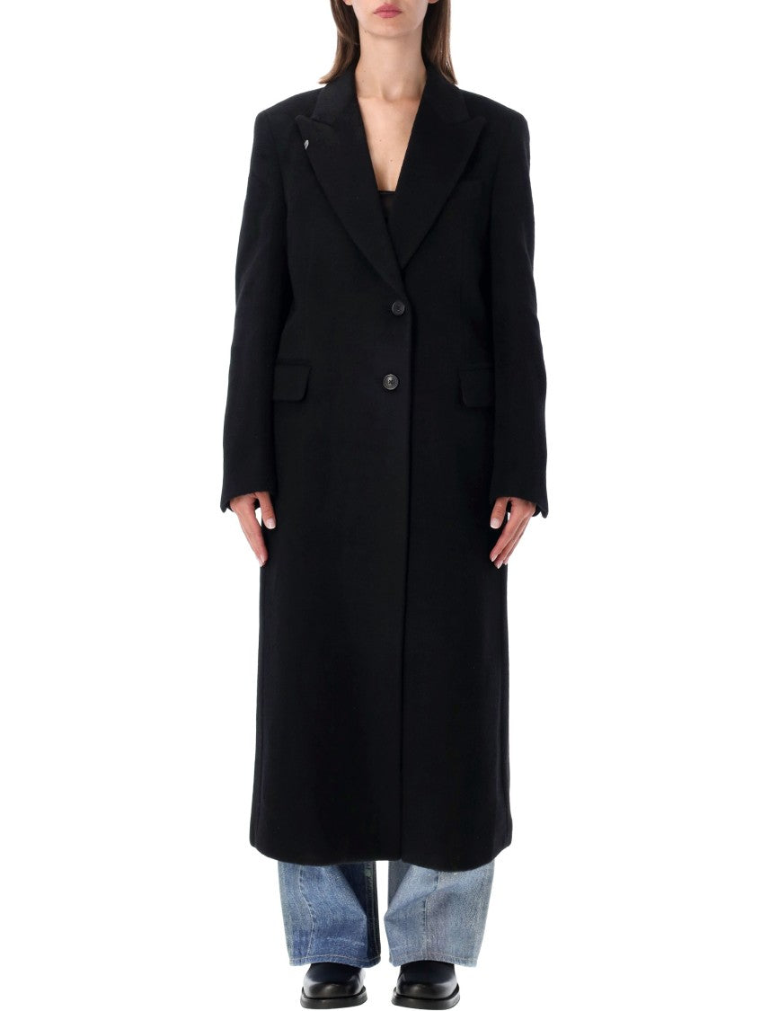 Our Legacy Tailored Long Black Coat With Notched Lapel And Flap Pockets