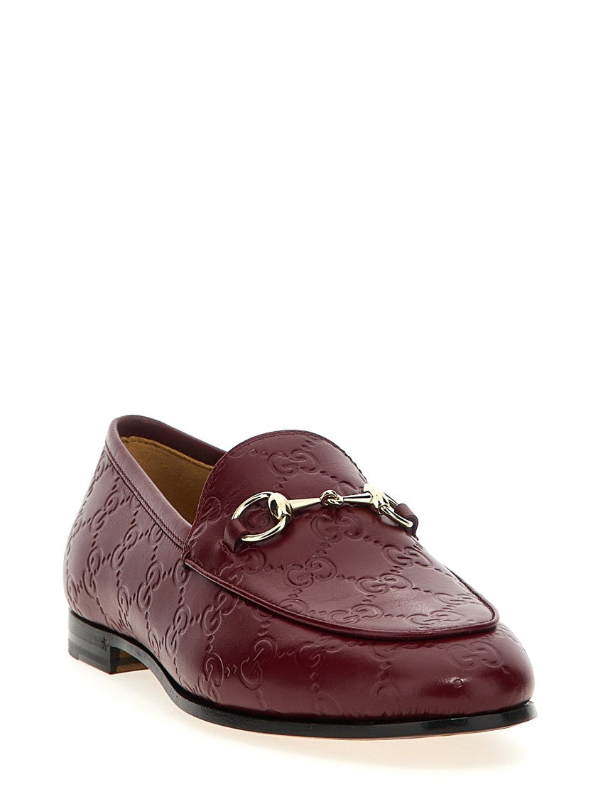 Gucci Gg Leather Jordaan Loafers With Metal Clamp Detail