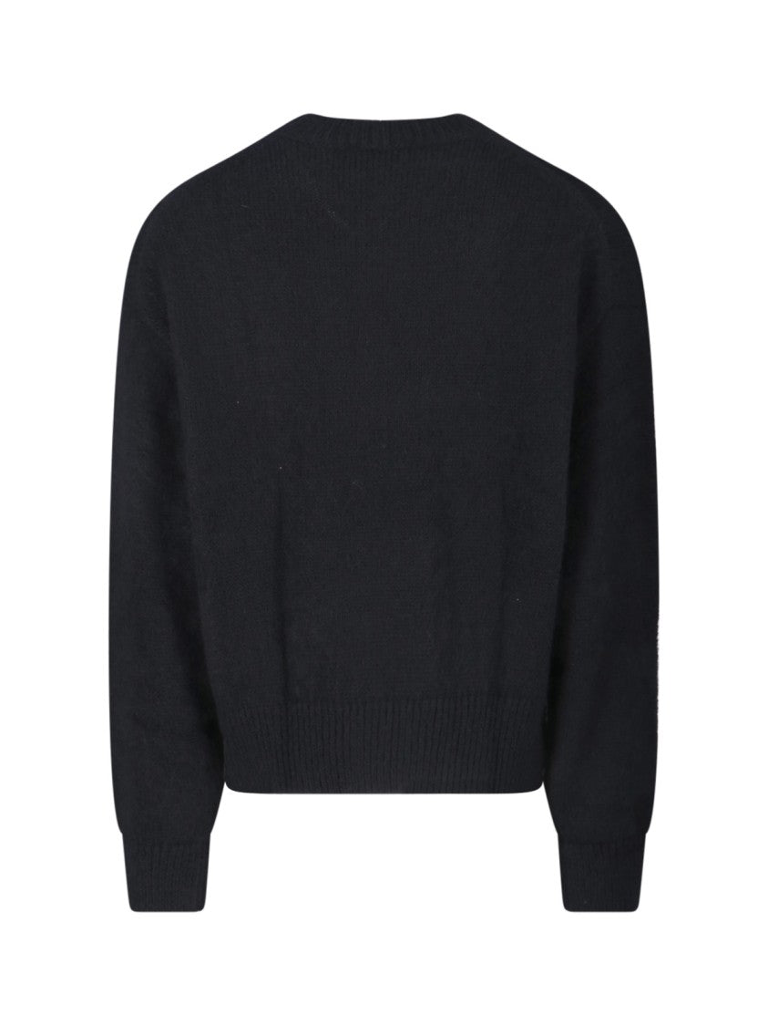 Studio Nicholson Minimalist Black Sweater With Round Neckline And Timeless Appeal