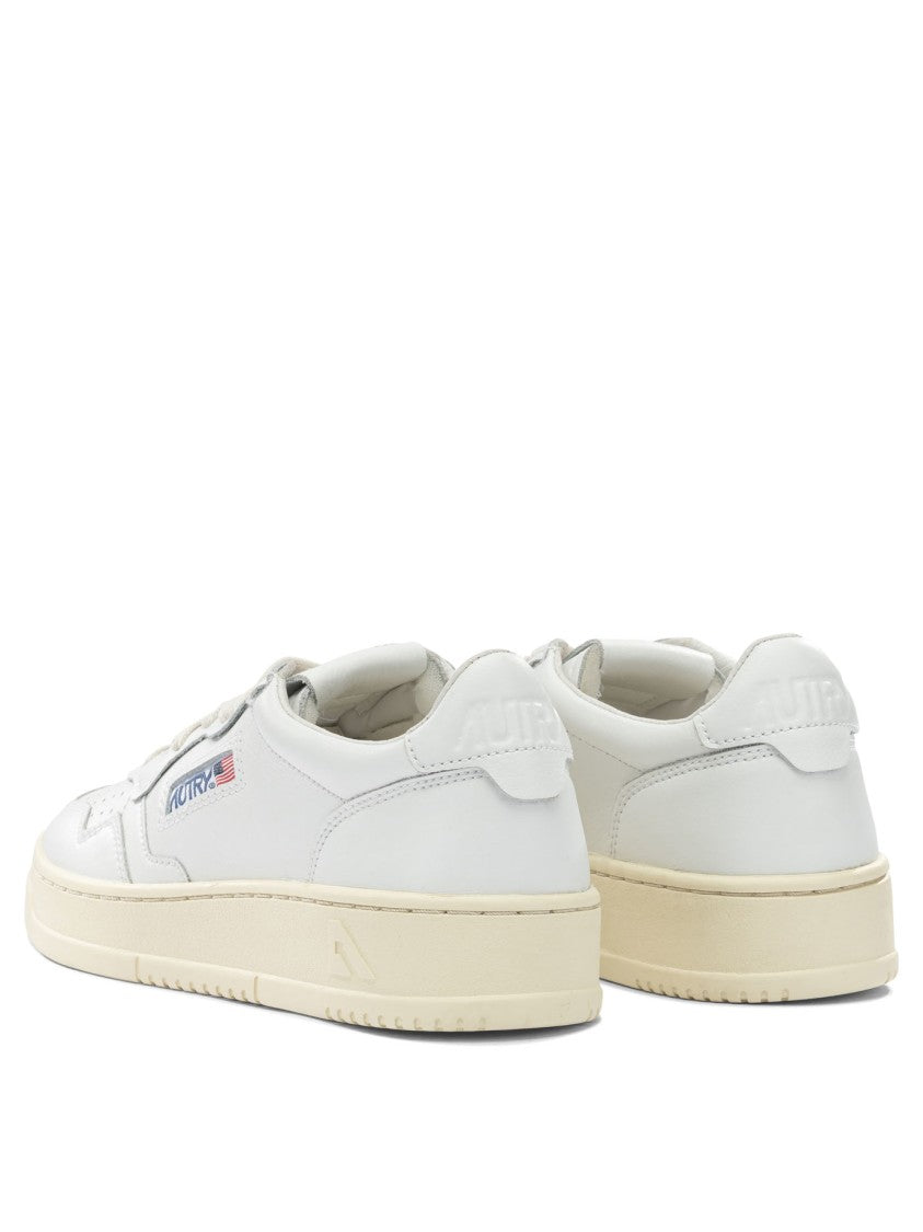Autry Minimalist Low-Top Sneakers With Perforated Detailing
