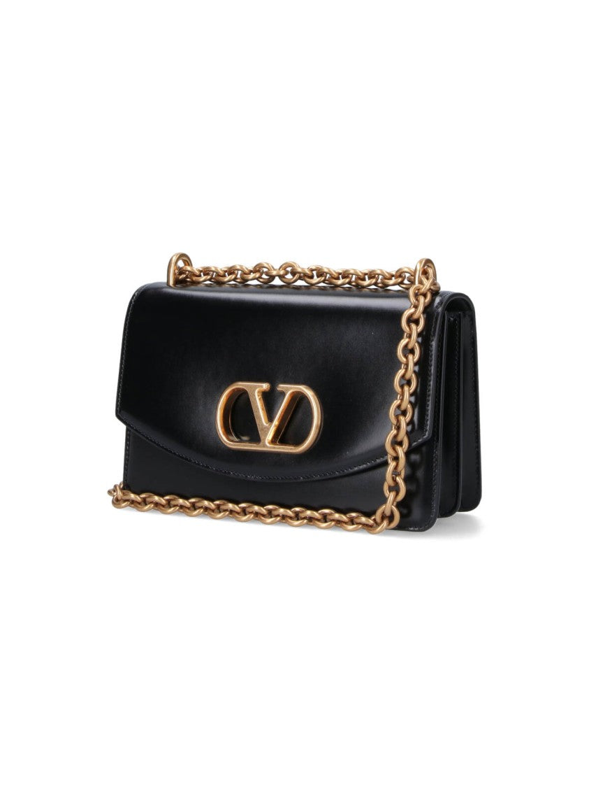 Valentino Garavani Structured Black Handbag With Gold-Tone Emblem And Chain Strap