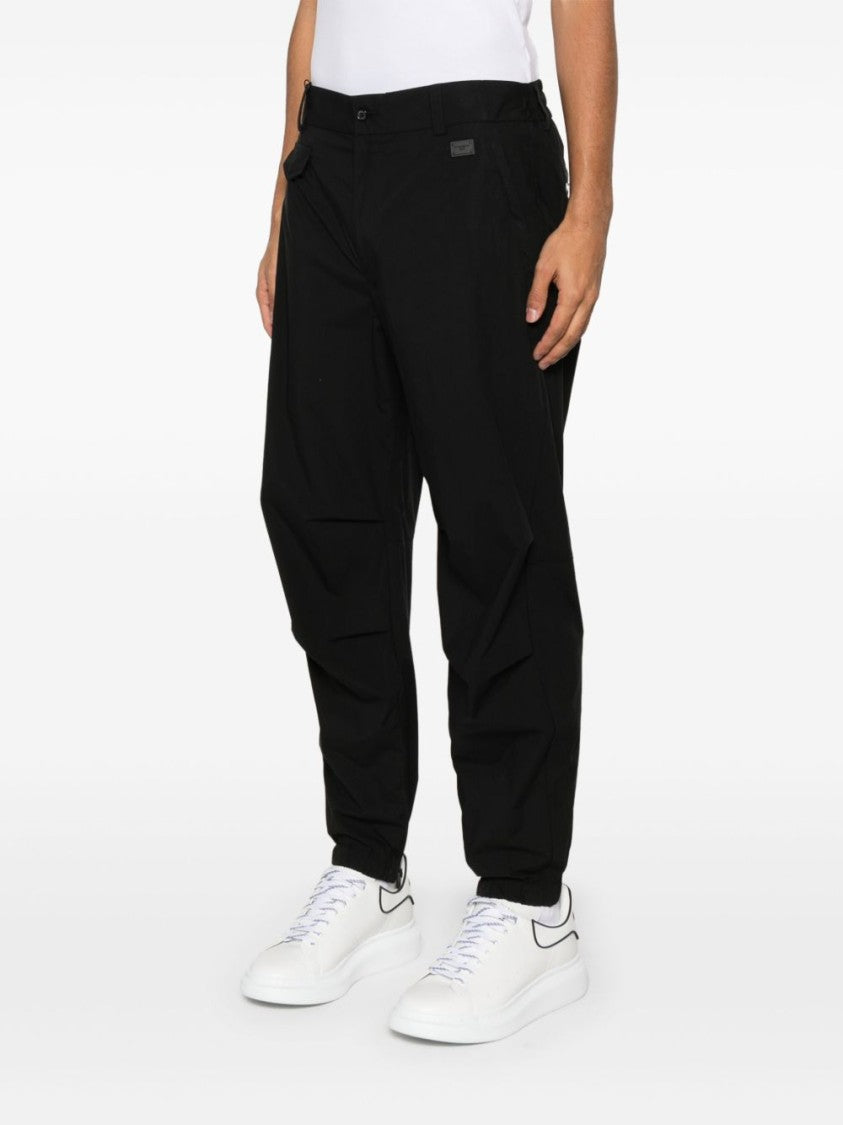 Dolce & Gabbana Black Tapered Trousers With Concealed Fastening
