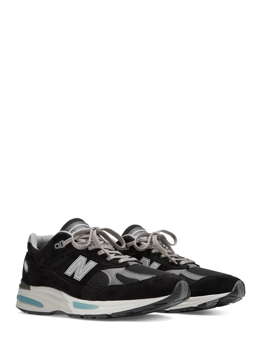 New Balance Mesh And Suede Black Sneakers With Light Blue Accents