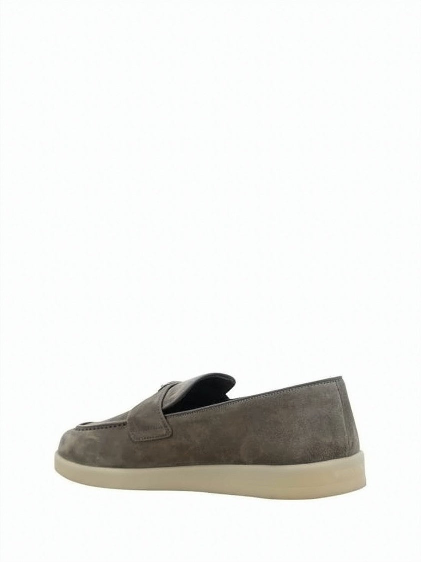 Prada Soft Suede Loafers With Metallic Emblem