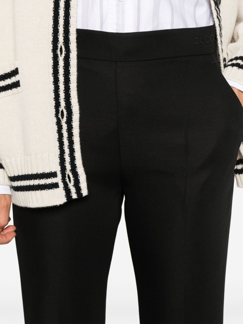 Gucci Flared Trousers With Embroidered Logo