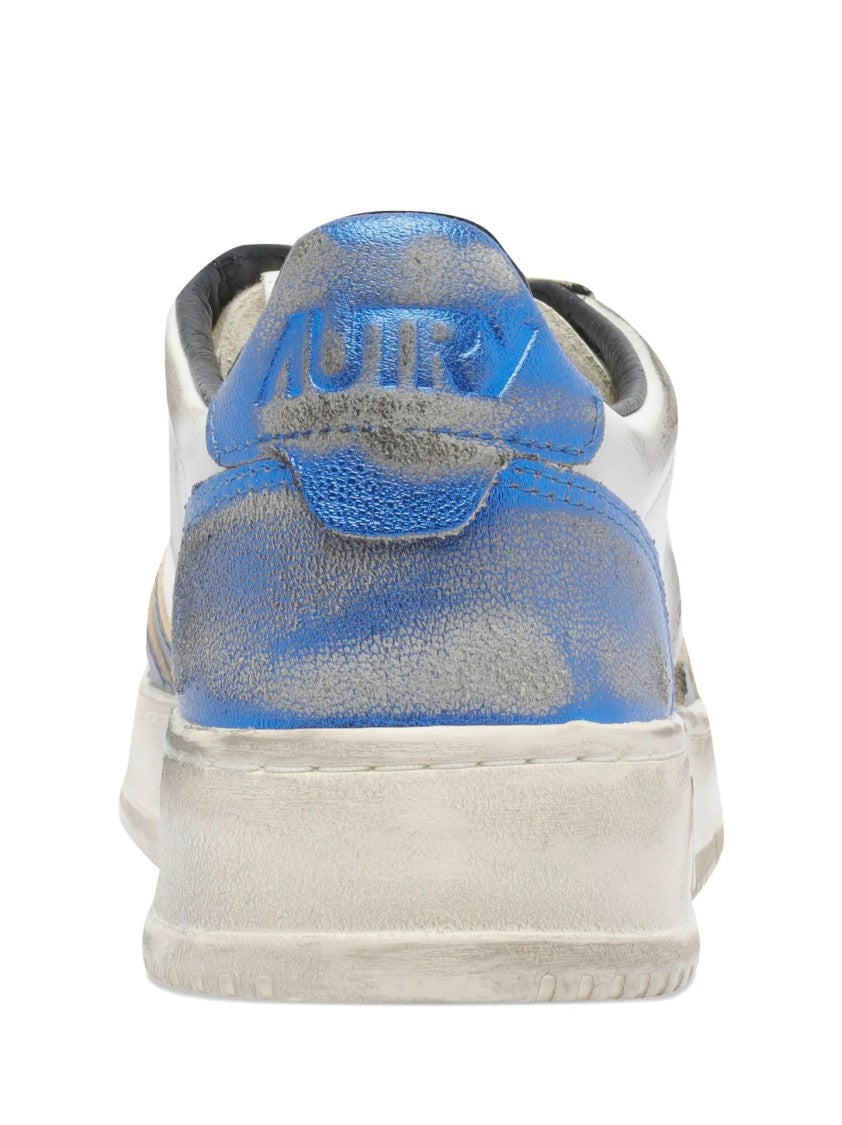 Autry Distressed White Leather Sneakers With Navy Accents