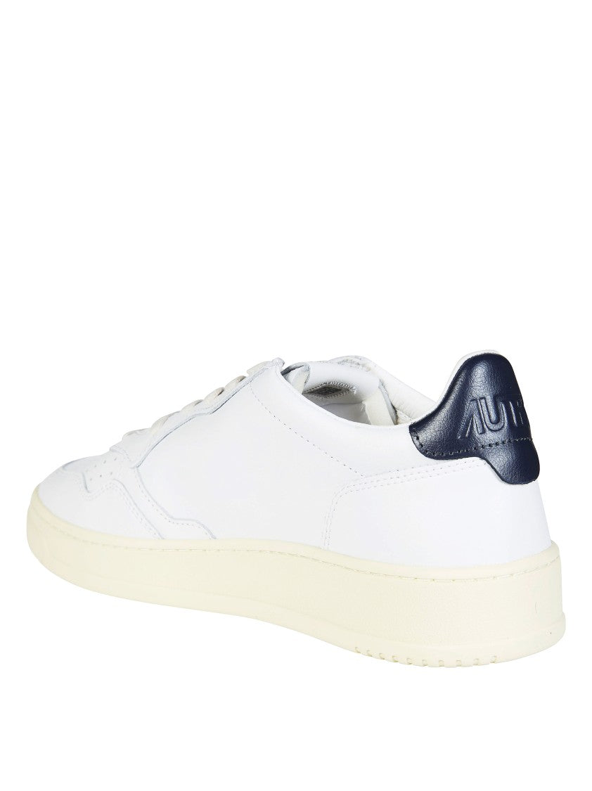 Autry White Medalist Low Navy Heel Sneakers
