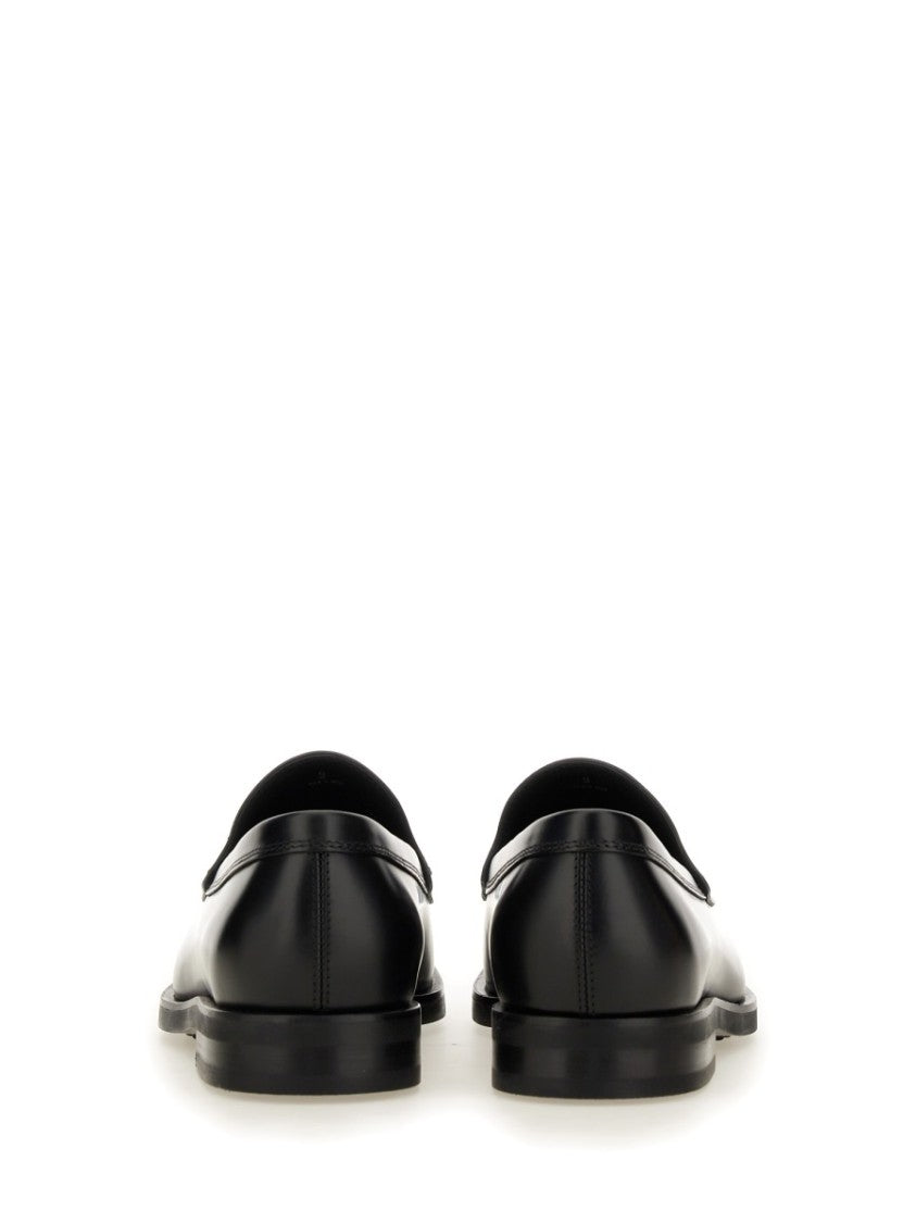 Tod's Smooth Leather Moccasin Loafers With Subtle Stitching