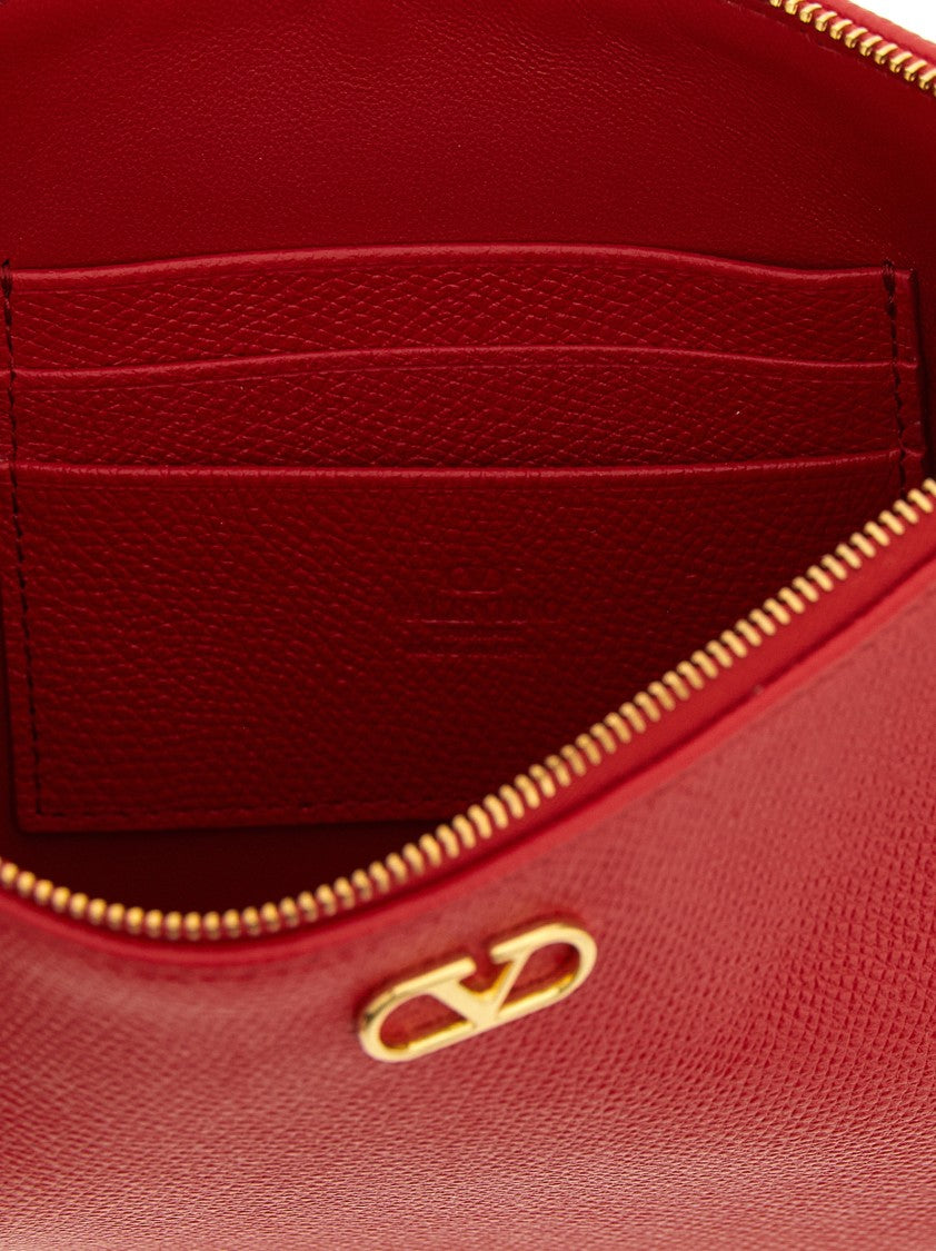Valentino Garavani Garnet Calf Leather Vlogo Signature Clutch Bag With Metallic Emblem