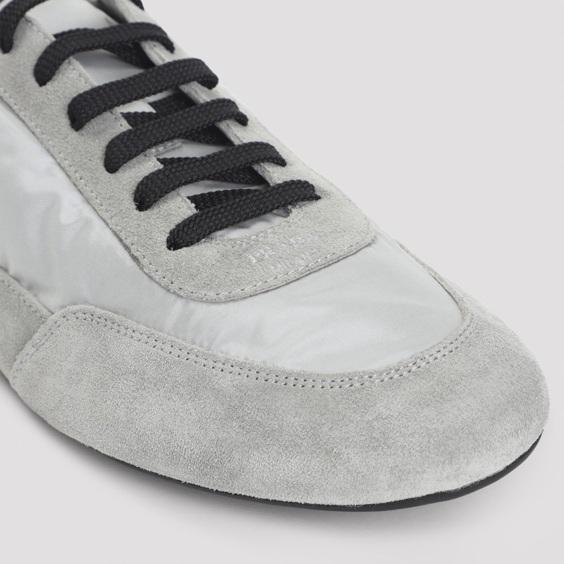 Prada Nube Calf Leather Collapse Sneakers With Silver-Tone Logo