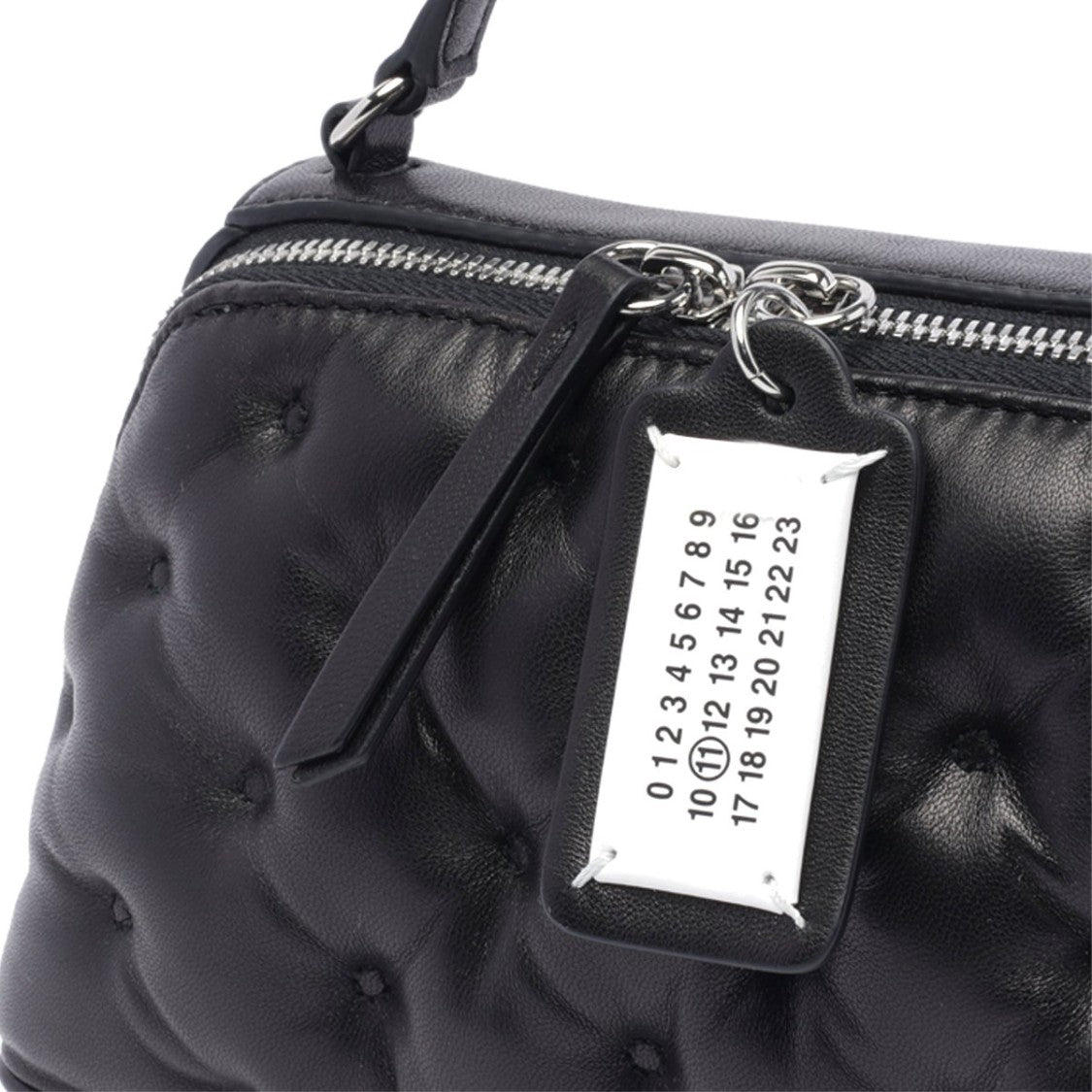 Maison Margiela Compact Black Handbag With Quilted Texture And Distinctive Tag