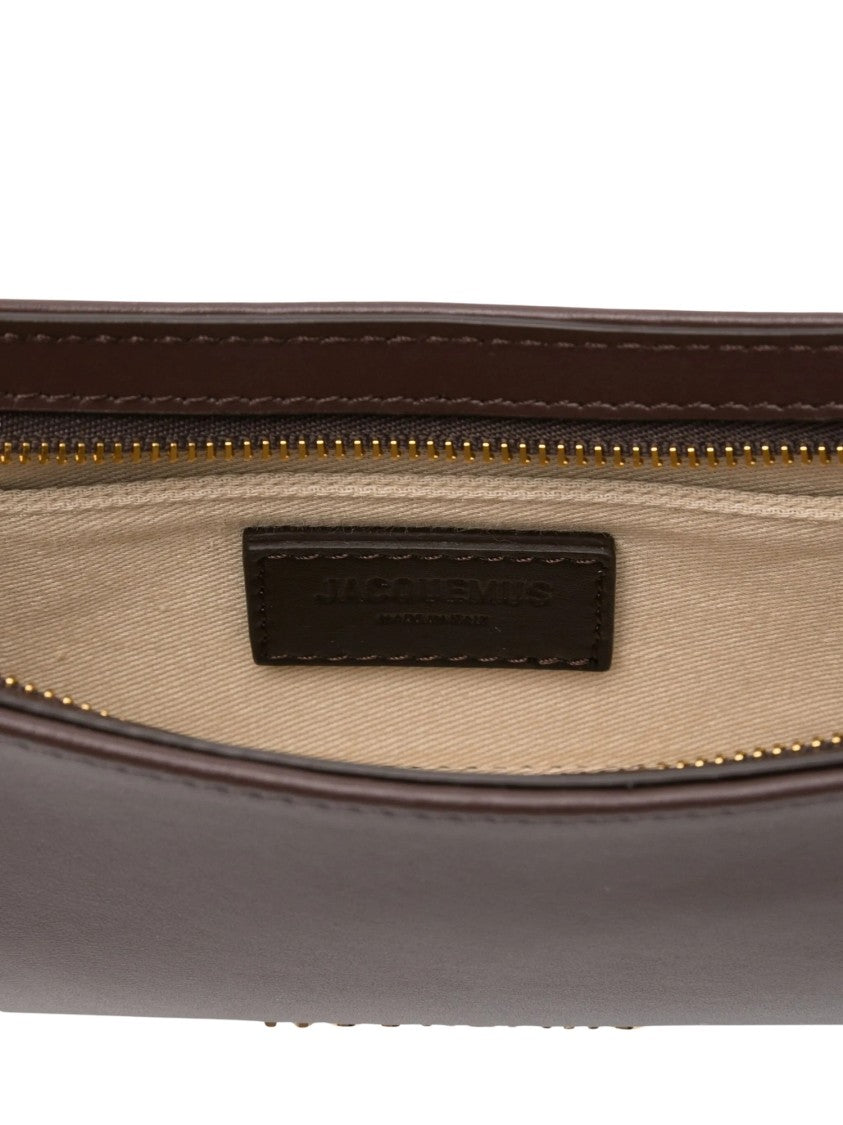 Jacquemus Sculpted Shoulder Bag With Curved Silhouette And Elegant Bead Accents