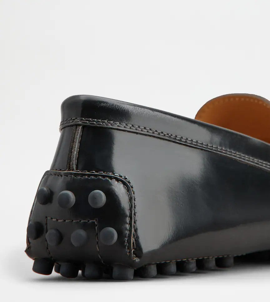 Tod's Polished Calfskin Moccasins With Metallic Bar Accent