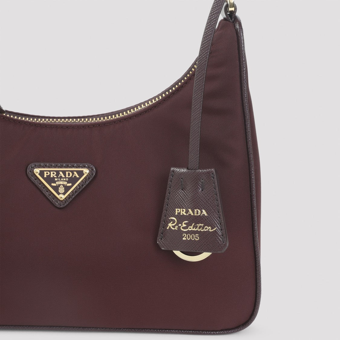 Prada Compact Burgundy Mini Bag With Top Handle