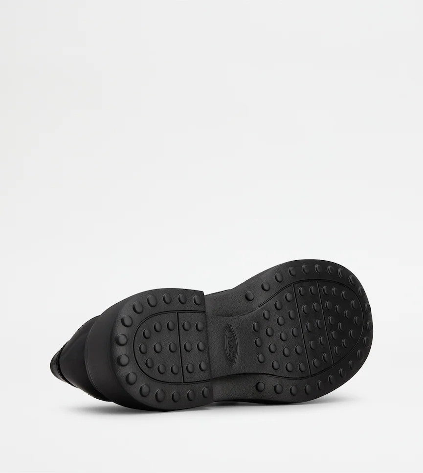 Tod's Timeless Black Calfskin Loafers With Textured Sole