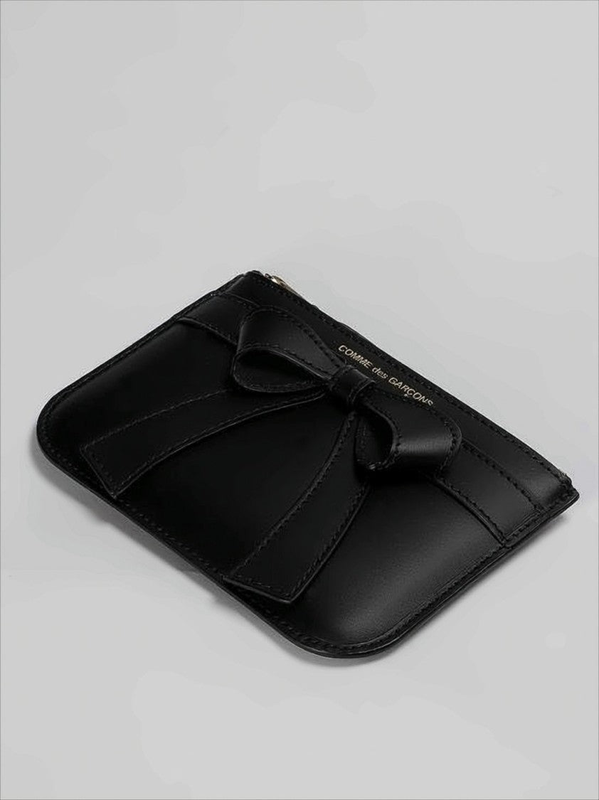 Comme Des Garçons Rectangular Leather Pouch With Prominent Bow Detail