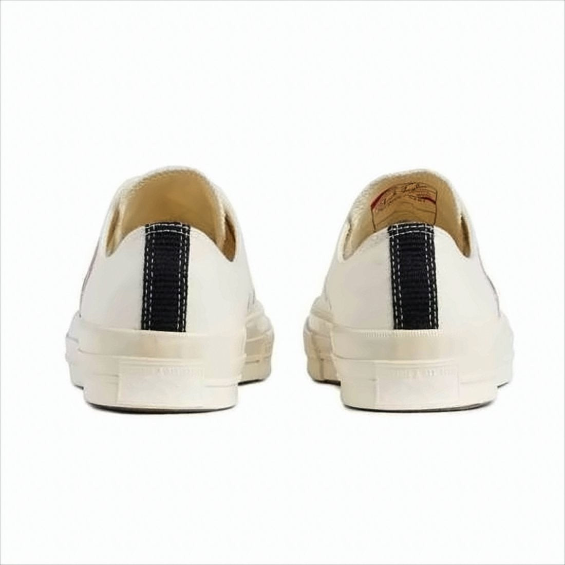 Comme Des Garçons Low-Top Sneakers With Distinctive Heart Graphic And Minimalist Design