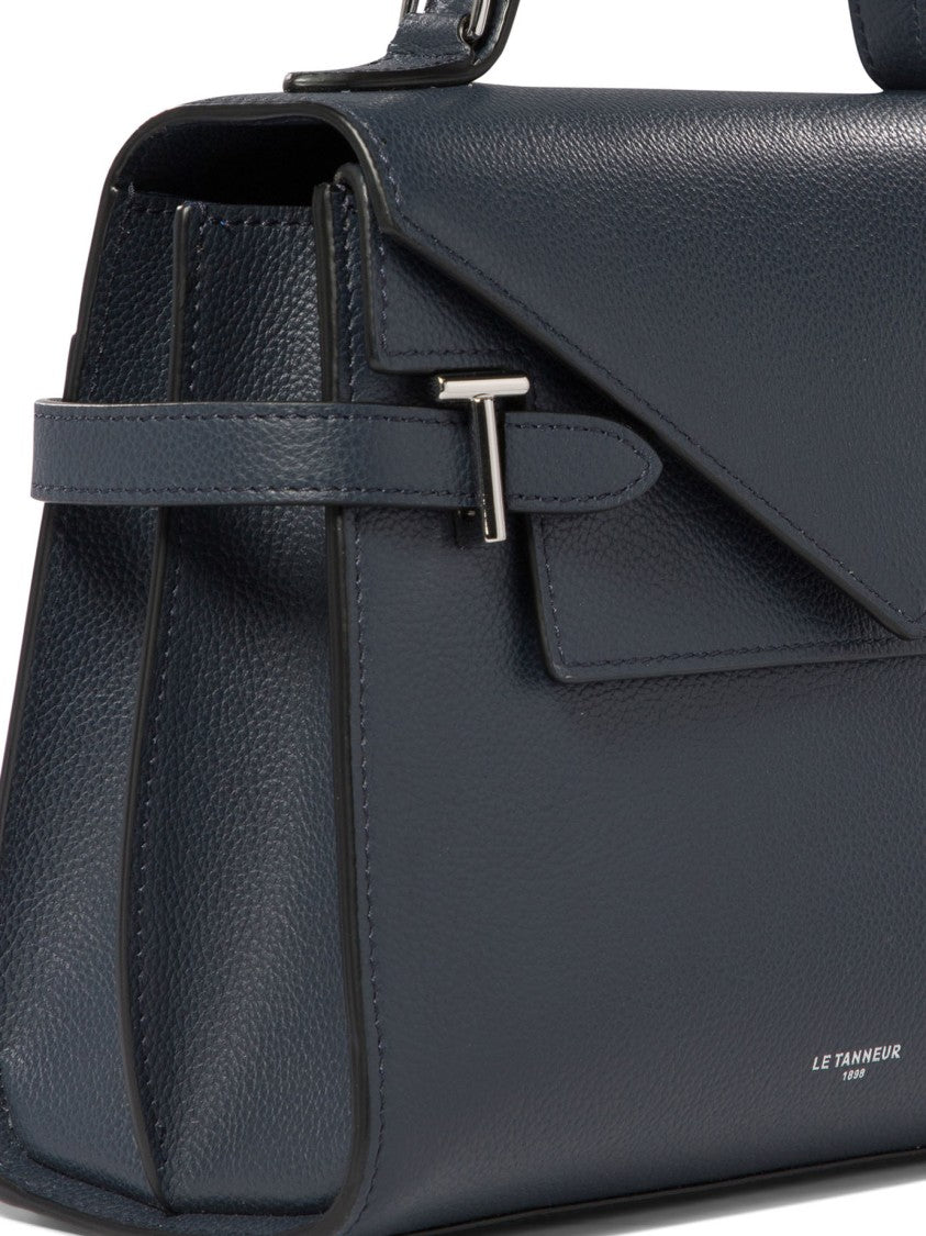 Le Tanneur Compact Structured Handbag With Triangular Flap Closure
