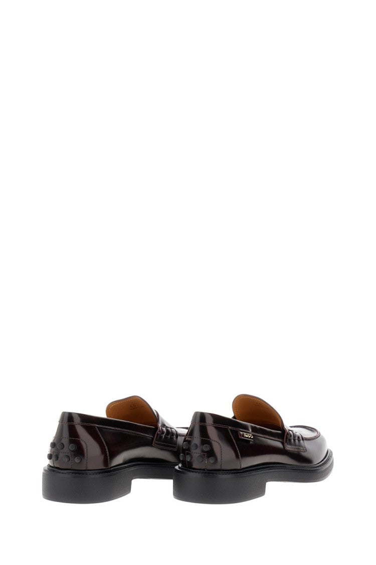 Tod's Polished Leather Moccasin With Subtle Logo Detailing