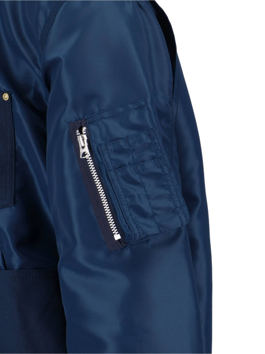 Sacai Detroit Canvas Ma-1 Jacket With Structured Silhouette And Contrast Detailing