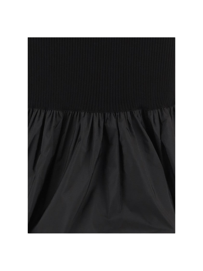 Patou Fitted Black Midi Dress With Ruffled Hem