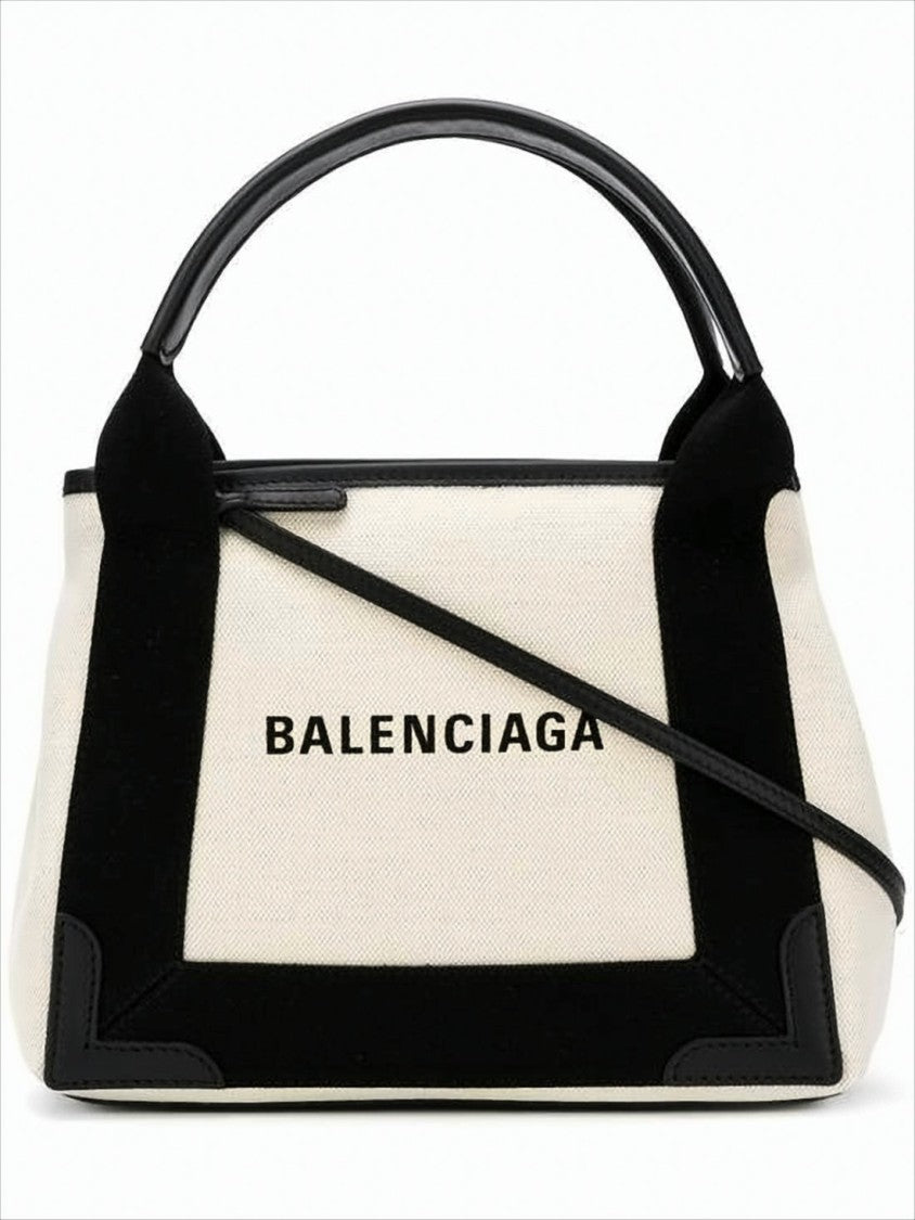 Balenciaga Compact Canvas Tote Bag With Calf Leather Trim And Bold Lettering