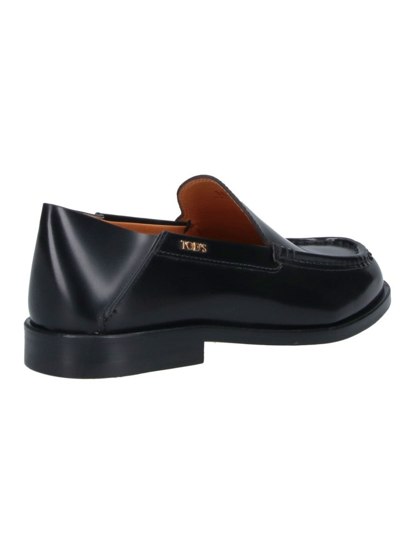 Tod's Black Rounded Toe Gold Logo Moccasins