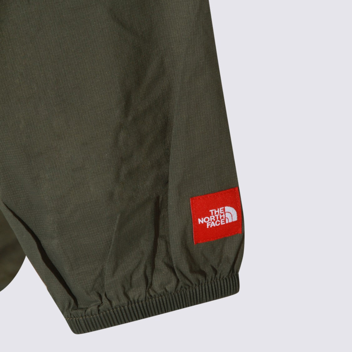 The North Face Minimalist Green Jacket With Front Zipper And Hood