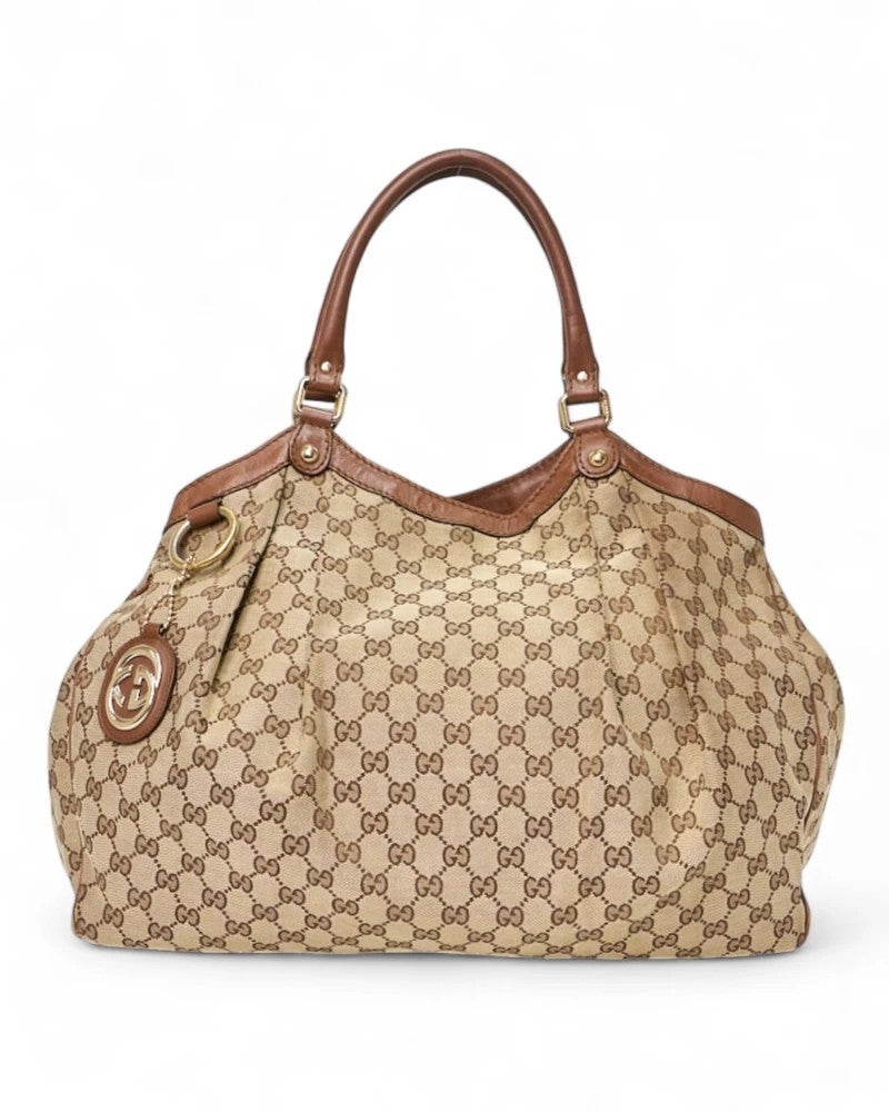 Gucci Sukey Large Gg Supreme In Brown