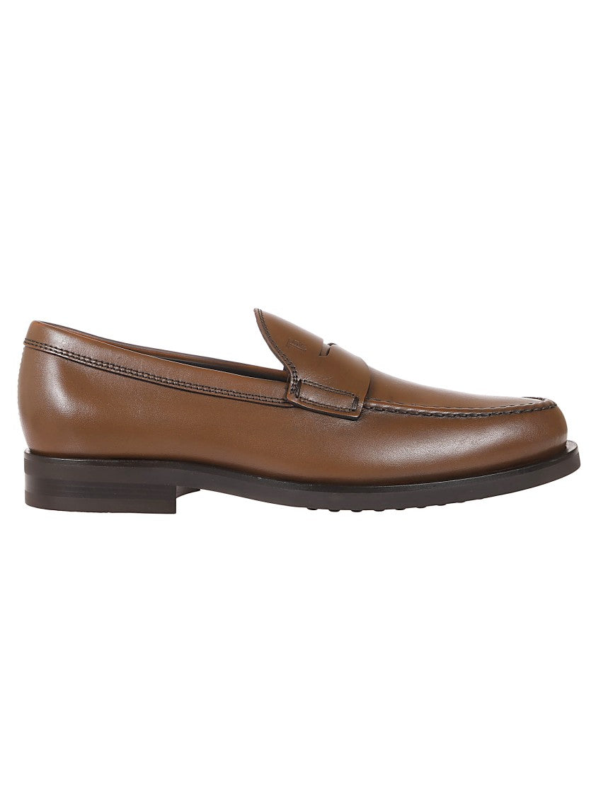 Tod's Penny Loafer Moccasin Shoes With Fine Stitching