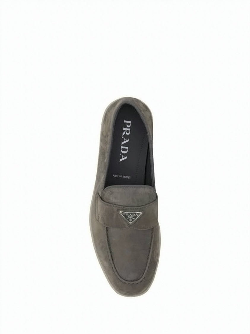 Prada Soft Suede Loafers With Metallic Emblem