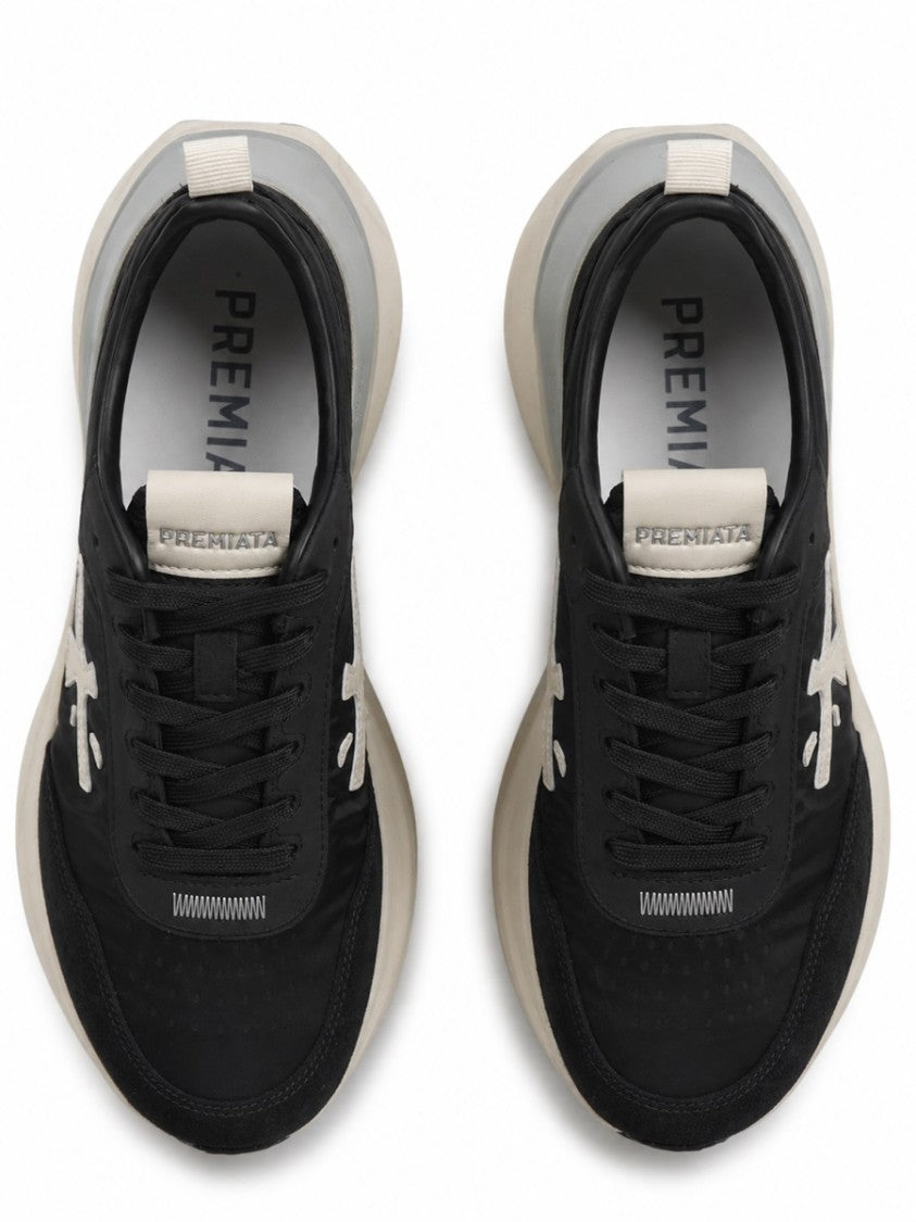 Premiata Cushioned Black Sneakers With Textured Outsole And Contrasting Logo