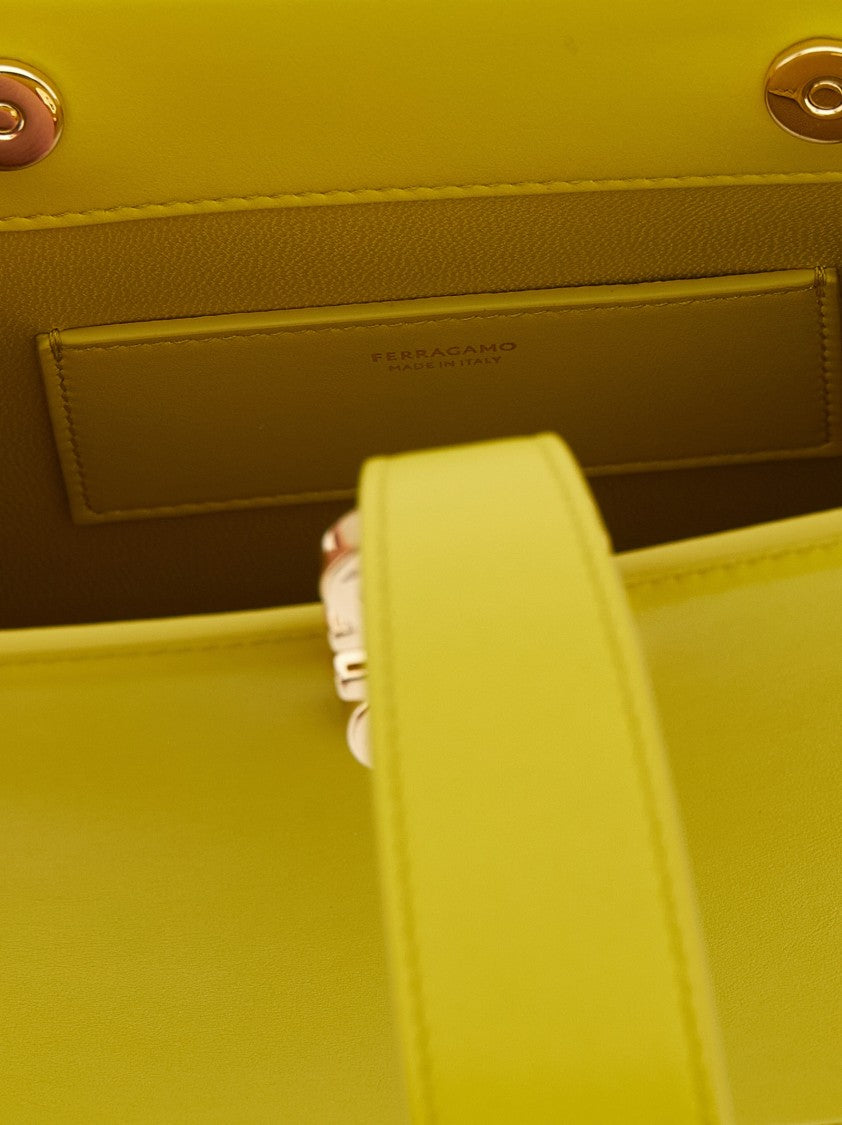 Ferragamo Mini Leather Clutch With Gancini Detail And Bracelet Strap
