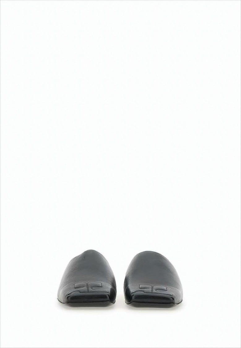 Courrèges Minimalist Black Lambskin Slip-On Mules With Embossed Detail
