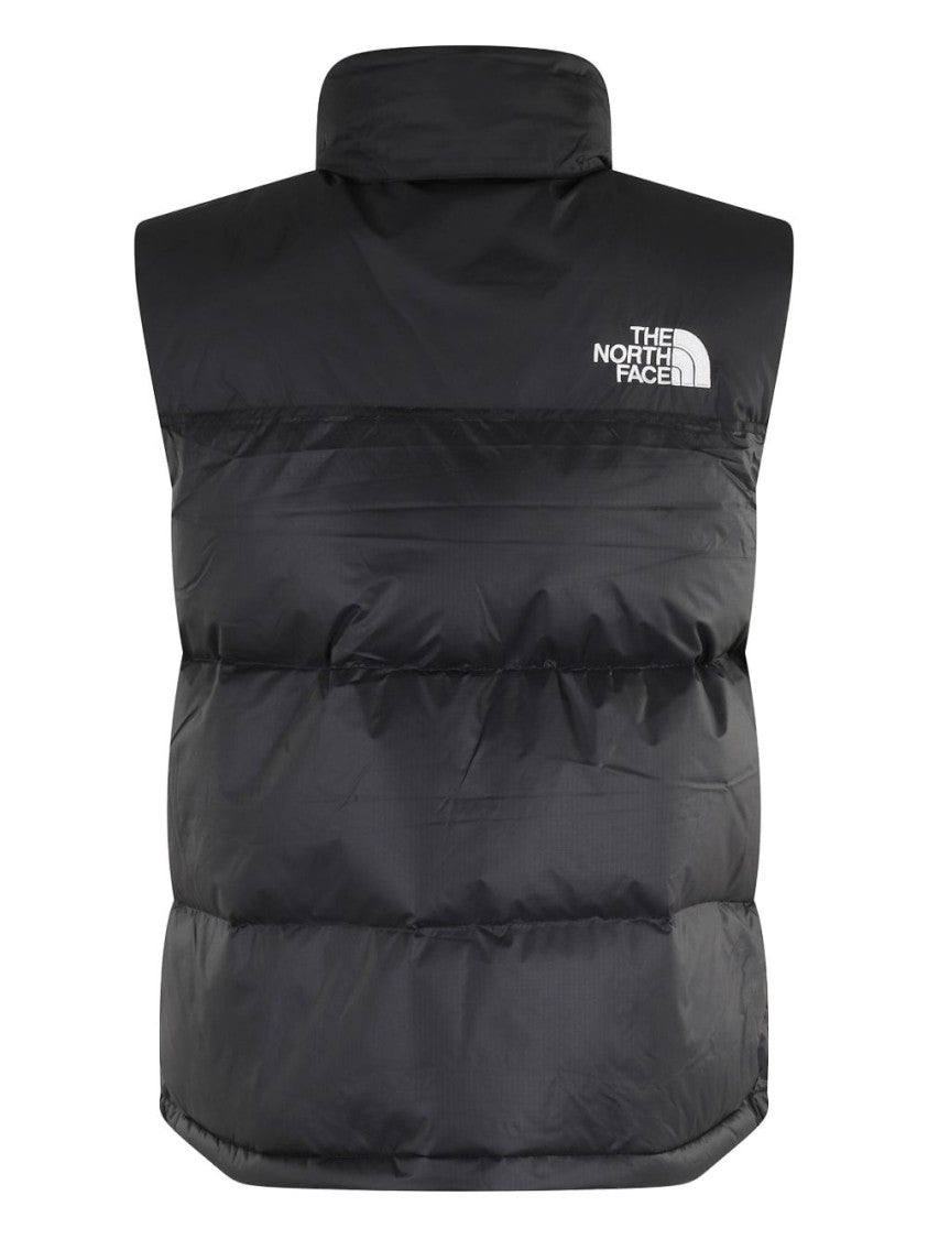 The North Face Sleeveless Puffer Vest With High Collar And Minimalist Design