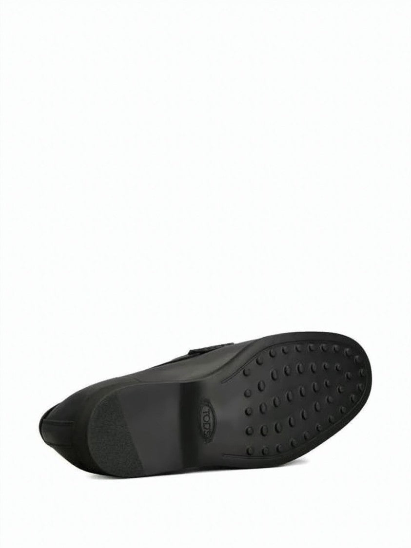 Tod's Black Leather Loafer With Classic Penny Strap And Rubber Pebbled Sole