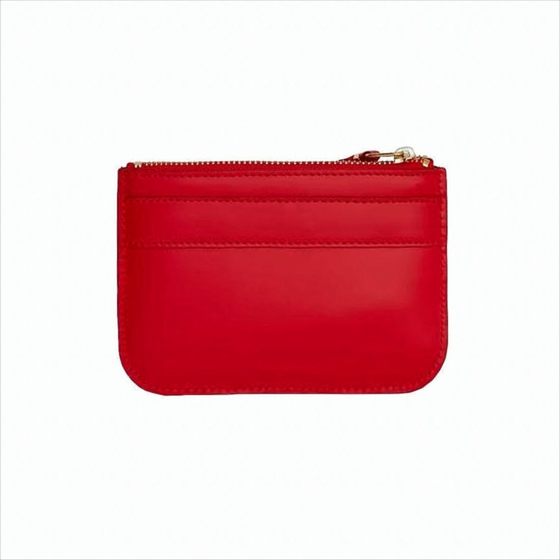 Comme Des Garçons Rectangular Leather Pouch With Prominent Bow Detail