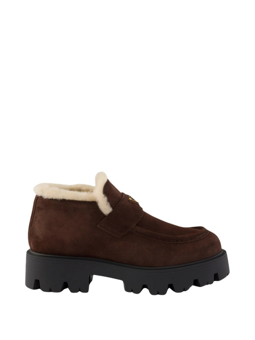 Prada Stride Shearling Lined Suede Boots