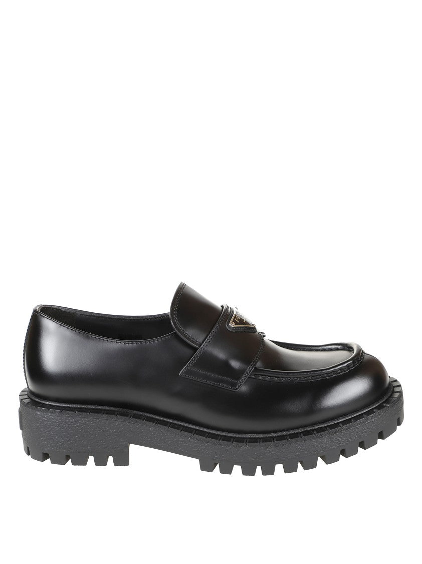 Prada Polished Black Leather Loafers With Chunky Rubber Sole