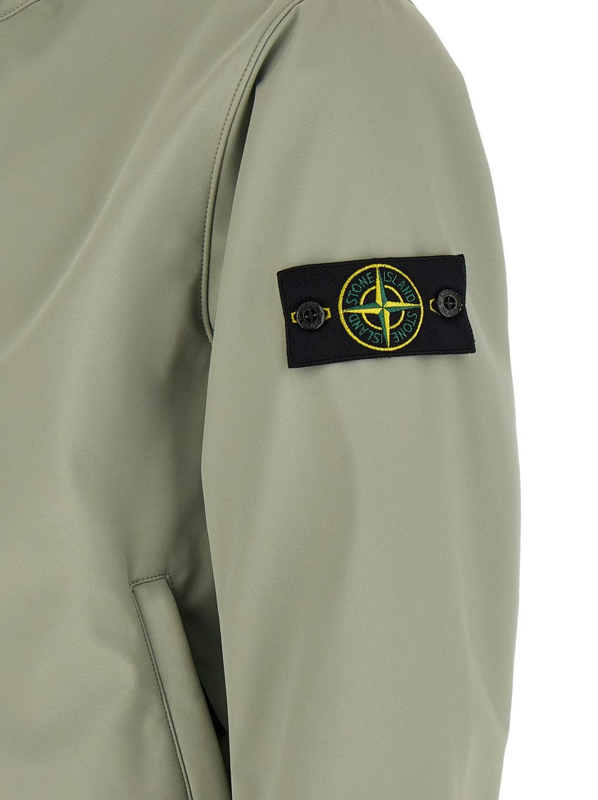 Stone Island Three-Layer Technical Jacket With Adjustable Hood And High Neck