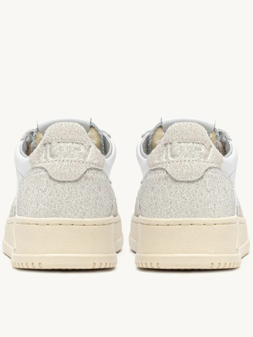 Autry Low-Top Sneakers With Perforated Detailing And Vintage Aesthetic
