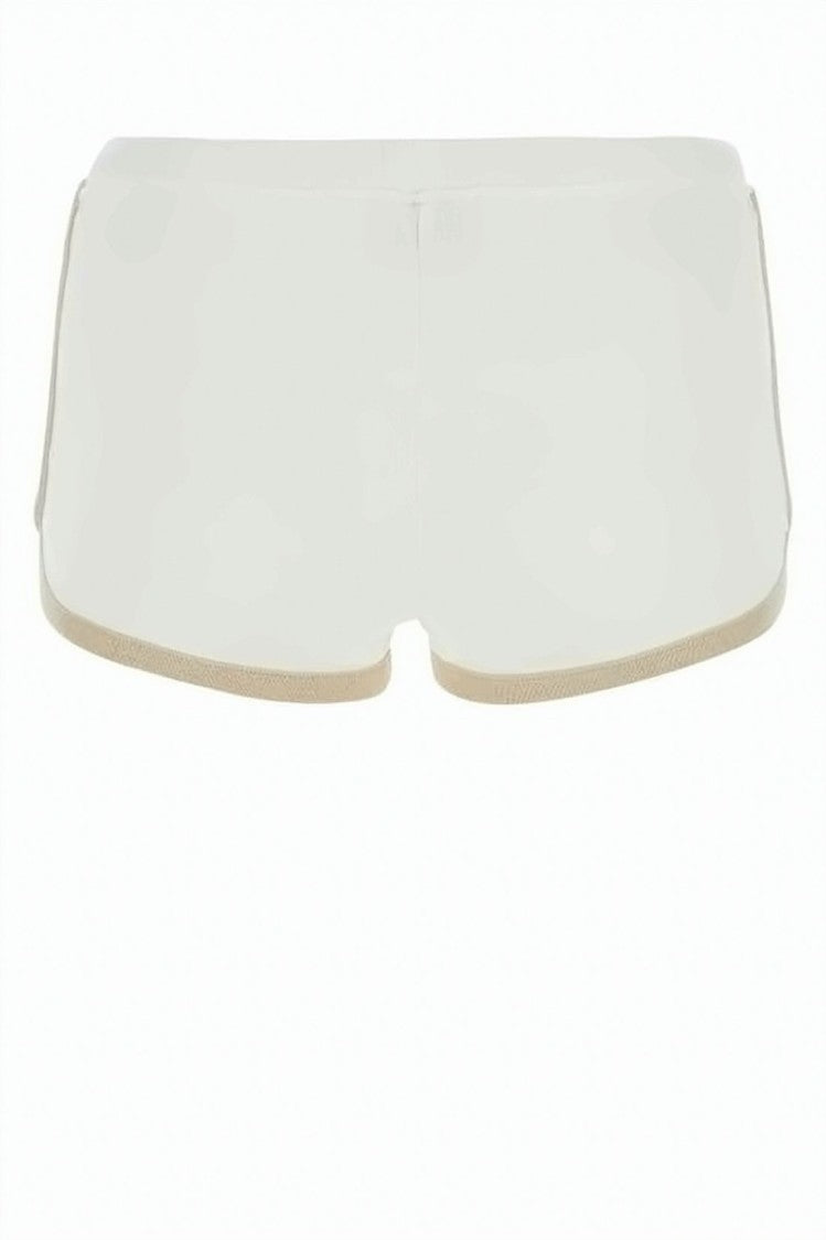 Courrèges Minimalist White Shorts With Subtle Trim And Curved Hem