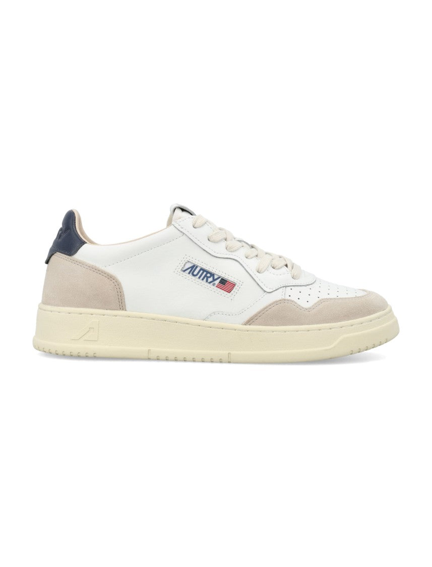 Autry Contemporary Tennis Sneakers With Suede Overlays And Contrasting Detail